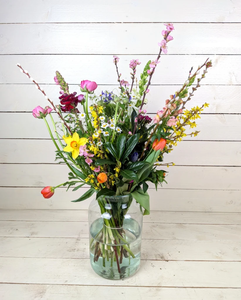 Kweeklokaal rouwboeket in vaas